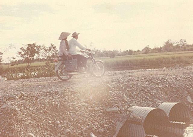 couple on motorbike